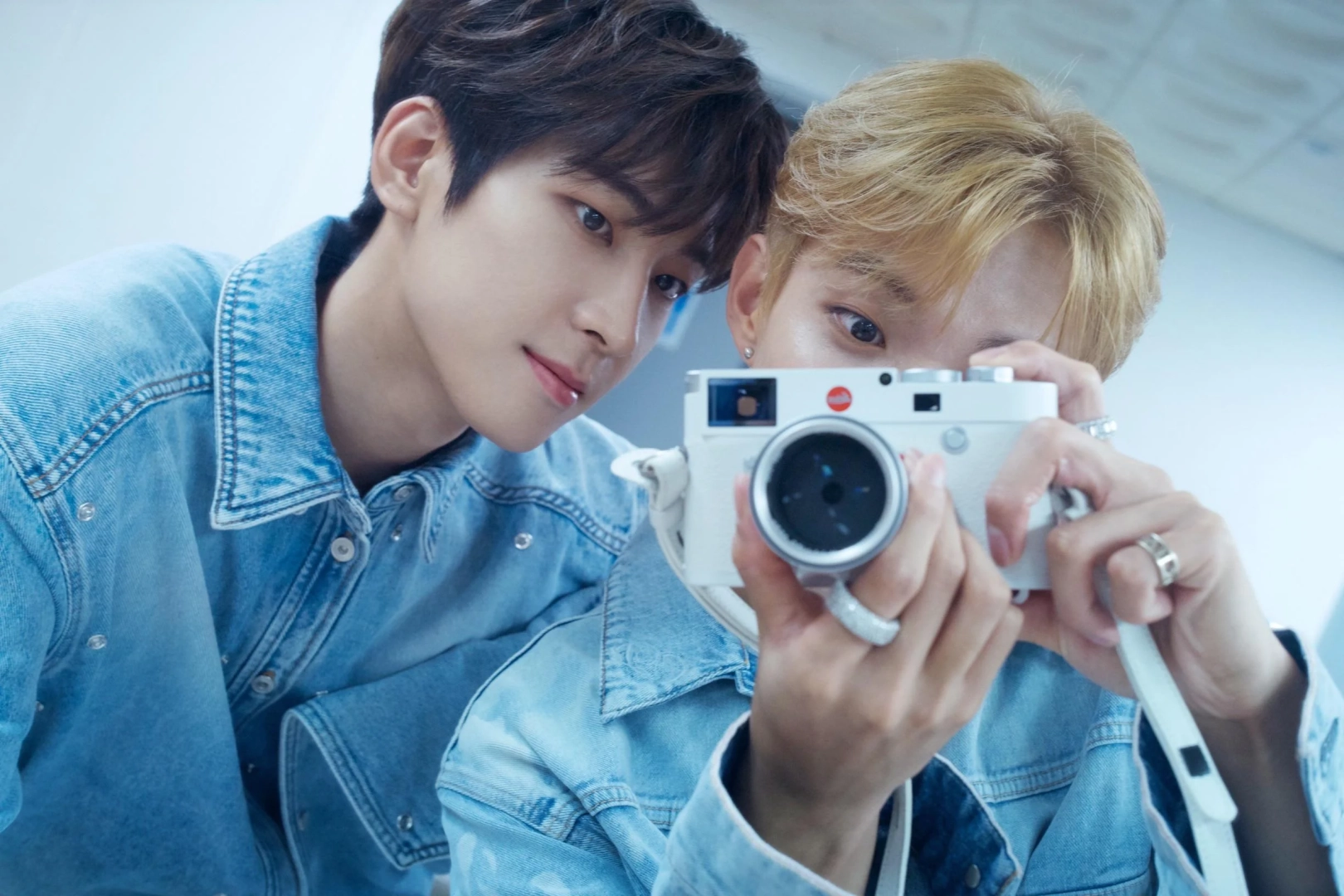 Wonwoo and DK taking a mirror selca