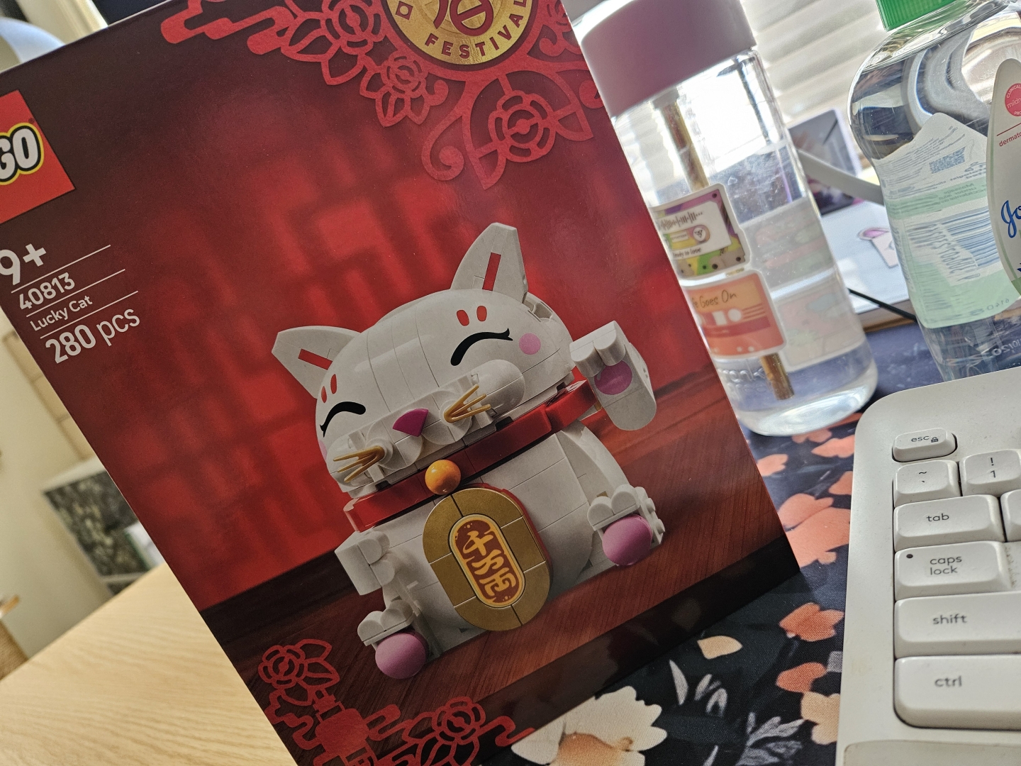 A box of cute lucky cat Lego on my desk